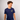 Man wearing a navy blueCreators of Champions T-shirt Blue-Yellow with a yellow logo on a plain background