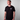 Man wearing a Creators of Champions T-shirt White Widow with a logo on a gray background