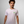 Man wearing a Creators of Champions T-shirt chemical Bride with a green logo on a gray background