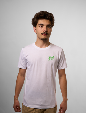 Man wearing a Creators of Champions T-shirt chemical Bride with a green logo on a gray background