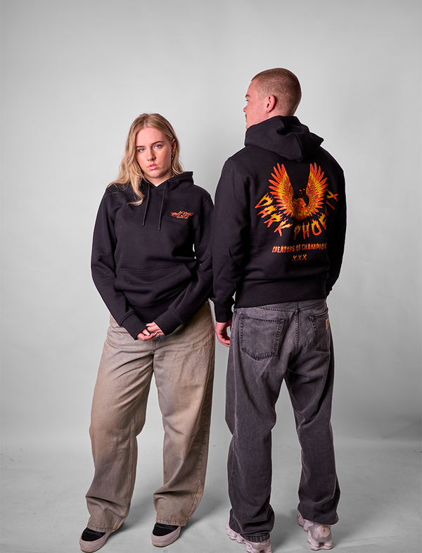 Two people wearingDark Phoenix Limited Editions with a phoenix design, one facing forward and one facing backward.