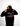 Person wearing a black GH Creators Of Champions Black Pink Hoodie with 'Creatures of Champions' text on the back against a white background
