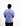 Person wearing a light blue t-shirt with "THE WORLDS LEADING HIGH"text on the back, standing against a white background