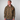 Person wearing a Green House camouflage hoodie with a small logo on a gray background