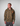 Person wearing a Green House camouflage hoodie with a small logo on a gray background