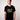 Man wearing a black t-shirt with Green House Logo - YELLOW
