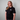 Person wearing a Green House World Cities T-Shirt Black with a logo on a gray background