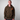 Man wearing a camouflage STRAIN HUNTERS hoodie 