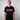 Person wearing a black t-shirt with 'Strain Hunters' logo on a plain background